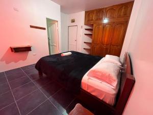 Postel nebo postele na pokoji v ubytování Hostal Neptuno - Poseidon