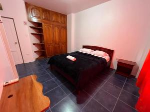 Postel nebo postele na pokoji v ubytování Hostal Neptuno - Poseidon