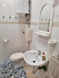 Koupelna v ubytování MainStreet apartman