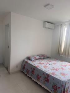Ένα ή περισσότερα κρεβάτια σε δωμάτιο στο Apartamento em Ilhéus +8 φωτογραφίες