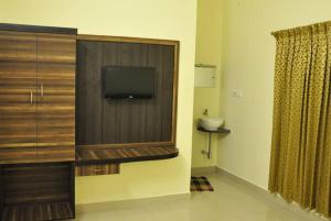 TV a/nebo společenská místnost v ubytování Hotel Priso