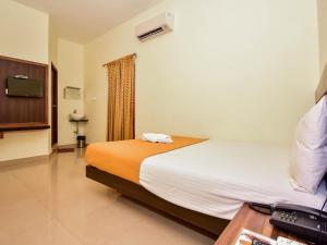 Postel nebo postele na pokoji v ubytování Hotel Priso