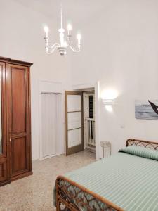 En eller flere senge i et værelse på Casa Smeraldo Salento, a strapiombo sul mare