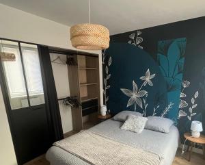 Postel nebo postele na pokoji v ubytování Appartement cosy et raffiné