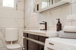 Kúpeľňa v ubytovaní Apartman Ivana