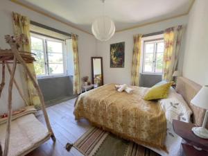 Ein Bett oder Betten in einem Zimmer der Unterkunft Casa SanAndo Integrative Medicine Treat & ReTreat Center
