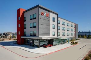 an office building with a va sign on it at avid hotel Austin NW - Lakeline by IHG in Austin