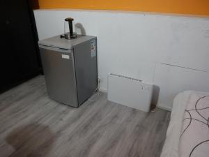 Kuchyň nebo kuchyňský kout v ubytování Chambre Jaune