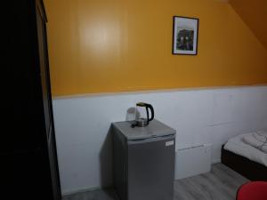 Postel nebo postele na pokoji v ubytování Chambre Jaune