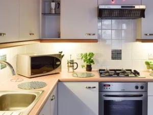 Η κουζίνα ή μικρή κουζίνα στο Elgin cottage