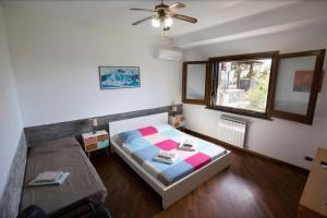 Posteľ alebo postele v izbe v ubytovaní La Circumetnea Home