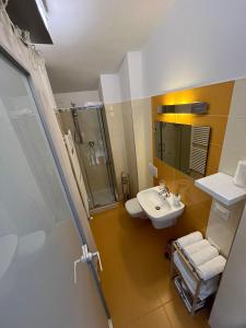 a bathroom with a sink and a shower at B&B San Salvo in San Salvo