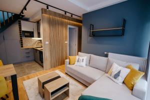 Η κουζίνα ή μικρή κουζίνα στο Nevis Apartment