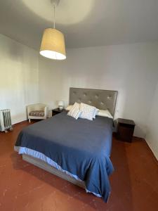 Ένα ή περισσότερα κρεβάτια σε δωμάτιο στο Chalet Independiente Pango Vistahermosa