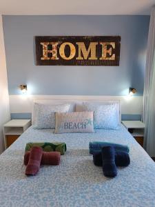 A bed or beds in a room at Casa del Mar Air-conditioned Apartment with Swimming Pools - Corralejo Playa