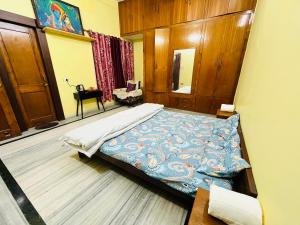 Postel nebo postele na pokoji v ubytování ReeGi Luxury Stay + 4 fotografie