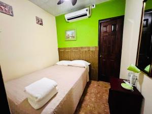 Katil atau katil-katil dalam bilik di HOTEL Ecológico BLUEROCK