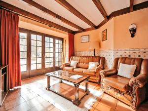 Et opholdsområde på Oliveira's House By Gt House