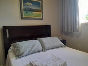 Postel nebo postele na pokoji v ubytování Casa c piscina, churrasq e Wi-Fi, lazer completo
