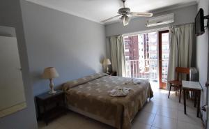 Postel nebo postele na pokoji v ubytování Hotel Venezia