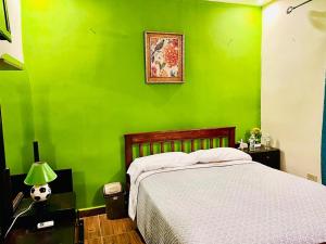 Katil atau katil-katil dalam bilik di HOTEL Ecológico BLUEROCK