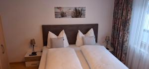 Ένα ή περισσότερα κρεβάτια σε δωμάτιο στο Apartment Eberharter