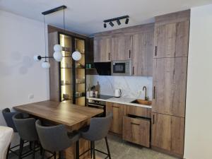 Kuchyň nebo kuchyňský kout v ubytování Rubin