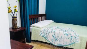 Katil atau katil-katil dalam bilik di HOTEL Ecológico BLUEROCK
