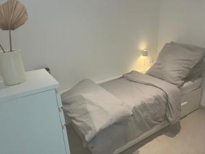 Postel nebo postele na pokoji v ubytování Studio Starnberg