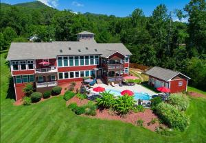 an aerial view of a house with a swimming pool at Deep Creek Manor in Bryson City