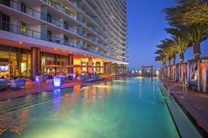 a swimming pool in the middle of a building at Stunning Beachfront 3-Bedroom Corner Residence in Hollywood