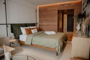 a bedroom with a large bed in a room at Ermou 18 in Athens