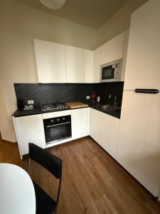 Kuchyň nebo kuchyňský kout v ubytování Casa Tyffany