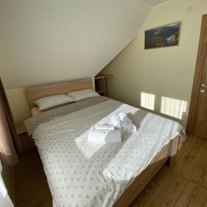 Postel nebo postele na pokoji v ubytování Vila Mirjana Tara