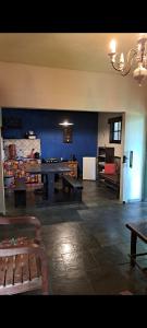 a large room with a ping pong table in it at Poente Guest House in Conceição da Ibitipoca