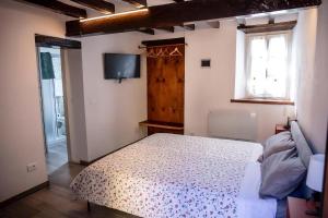 A bed or beds in a room at L'angolo nascosto