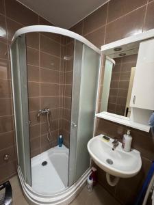 Koupelna v ubytování Golf Apartman Obrenovac, sa parkingom