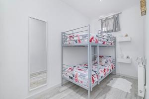 Voodi või voodid majutusasutuse Apartamento Vista Nevada toas