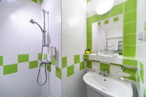 A bathroom at Hotel Flóra