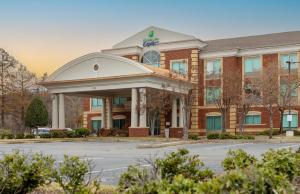 a hospital building with a domed building at Holiday Inn Express Hotel & Suites Memphis/Germantown by IHG in Memphis