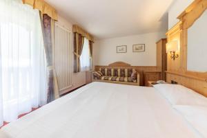 Posteľ alebo postele v izbe v ubytovaní Hotel Plank