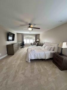 Ένα ή περισσότερα κρεβάτια σε δωμάτιο στο The Vegas Villa