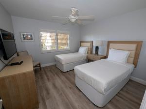 Shell Island Beach Club客房内的一张或多张床位
