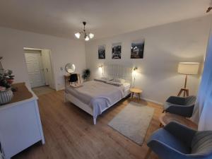 A bed or beds in a room at Kislakás Esztergomban