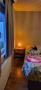 Postel nebo postele na pokoji v ubytování Maison Louise