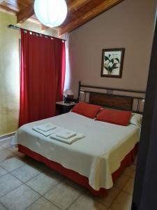 Ένα ή περισσότερα κρεβάτια σε δωμάτιο στο Apart Hotel Hualta Picum