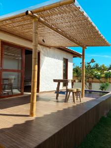 Μπαλκόνι ή βεράντα στο Bangalô com piscina - japaratinga