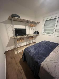 Ένα ή περισσότερα κρεβάτια σε δωμάτιο στο ECOVILLE AP