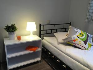 Posteľ alebo postele v izbe v ubytovaní Arcus Premium Hostel