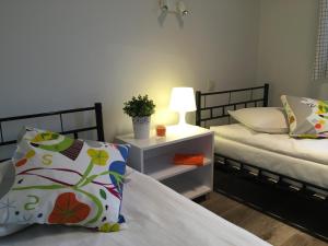 Posteľ alebo postele v izbe v ubytovaní Arcus Premium Hostel